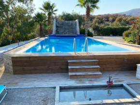Ferienhaus in Ermioni mit Grill, gemeinschaftlichem Pool und Terrasse